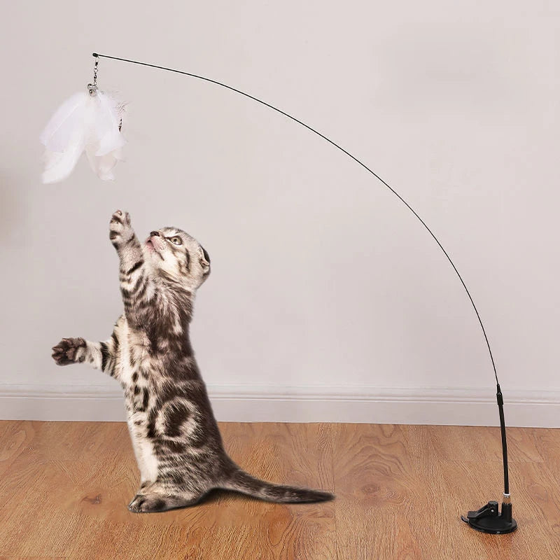 Juguete interactivo con plumas, campana y ventosa para gatos