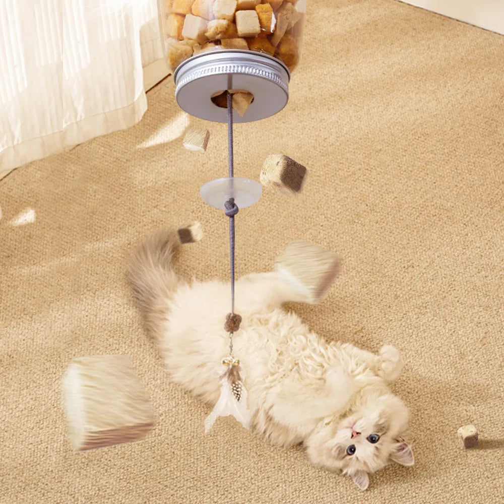 Juguete interactivo colgante con plumas, cascabel y dispensador de comida para gatos
