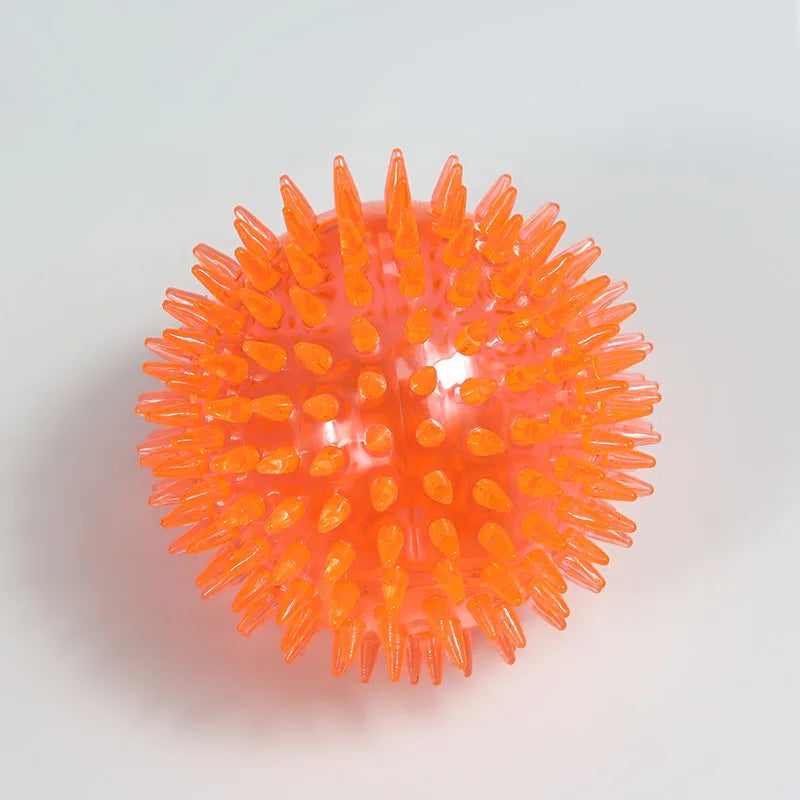 Pelota de goma TPR para perros – Limpieza dental y juego interactivo