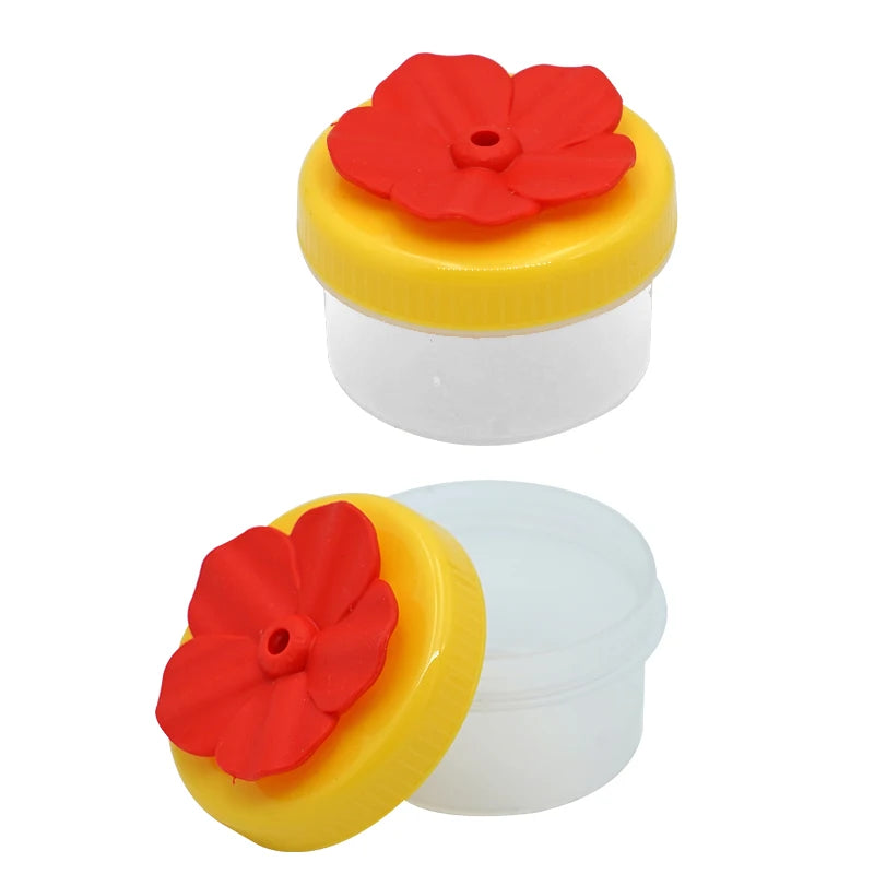 Comedero colibrí de plástico con diseño decorativo y funcional para jardín y uso en interior