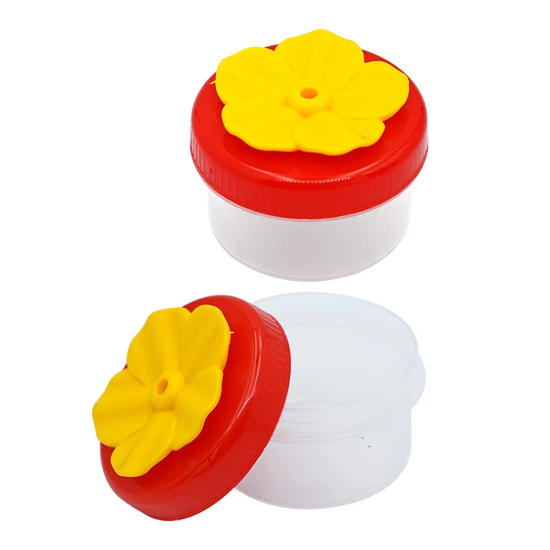 Comedero colibrí de plástico con diseño decorativo y funcional para jardín y uso en interior