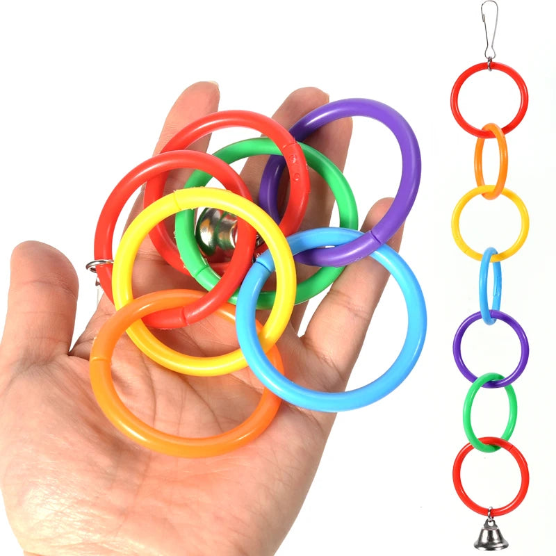 Juguete para pájaros con campana y anillo trepador colorido