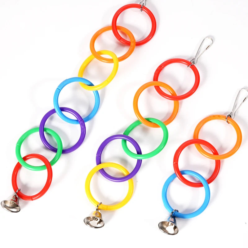 Juguete para pájaros con campana y anillo trepador colorido