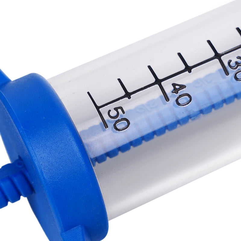 Jeringa veterinaria para animales con aguja de acero inoxidable y capacidad variable